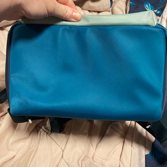 Brand new Carried maybe twice. Beautiful peacock blue pack back purse. - Picture 2 of 4